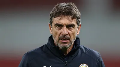 Falkirk boss John McGlynn says Dundee United's three bids for Brad Spencer were 'embarrassing' and far below the...